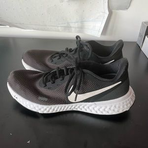 Used Nike revolution running shoes womens size 9